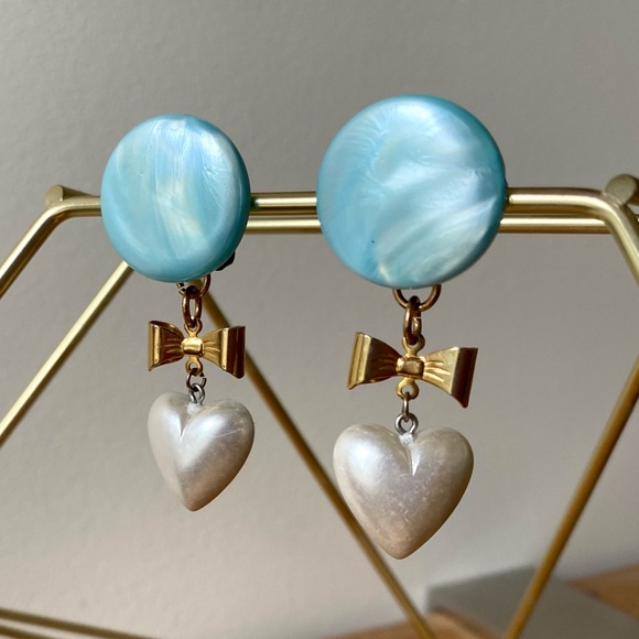 Redesigned blue opalescent clip on earrings with bow and faux pearl heart dangle - Picture 5 of 13
